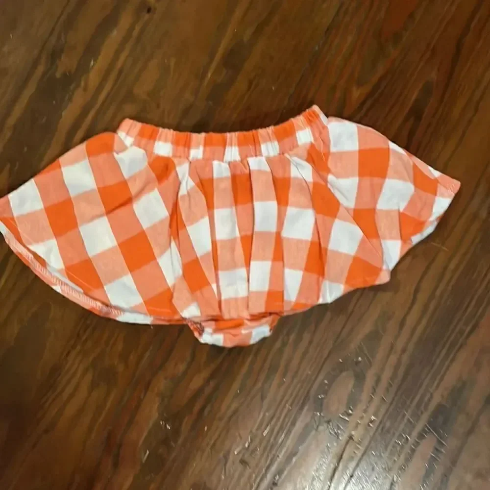 New in package Pumpkin outfit. 6-12 months.